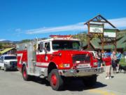 A thumb nail view of Grand Lake, Colorado during Constitution Week in September looking at a large fire truck from the Grand Lake Fire Protection District; click here to open a window with a larger picture.